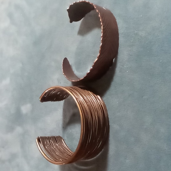 2 cuff bracelets one copper tone feather shaped one a brassy wire wrapped - Picture 2 of 4